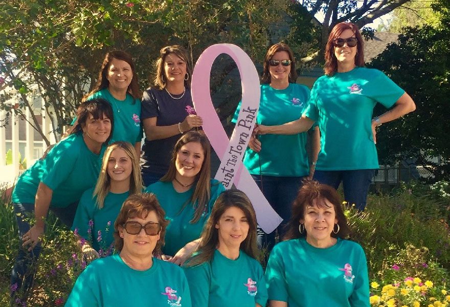 volunteers of the paint the town pink event in opelousas, sponsored by MMRBH