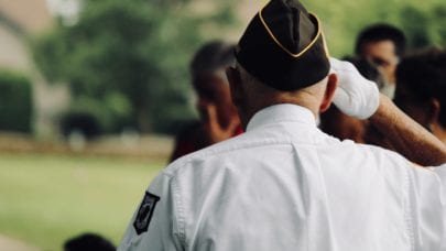 man in uniform saluting for legal help for veterans blog