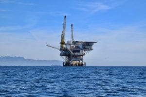 the jones act blog photo of an oil rig at sea