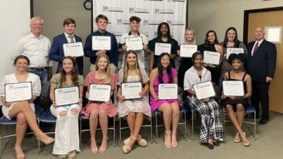 MMRBH's 2022 scholarship recipients smile as they receive their awards